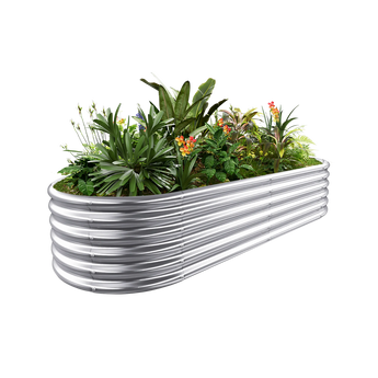 18" tall oval galvanized raised garden bed, 6x3ft, filled with diverse plants and flowers