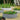 Galvanized round raised garden bed filled with strawberry plants