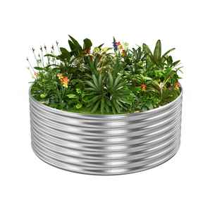 Corrugated galvanized steel raised garden bed with vibrant plants and flowers