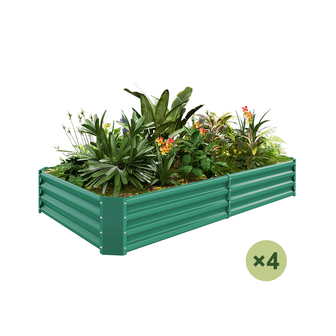 4-pack of green galvanized raised garden beds filled with lush plants and flowers, showing the corrugated metal structure.