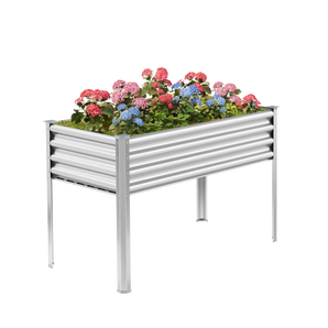 Land Guard 32" Tall 4' x 2' Metal Elevated Garden Bed in Starlight Silver planted with vegetables and flowers