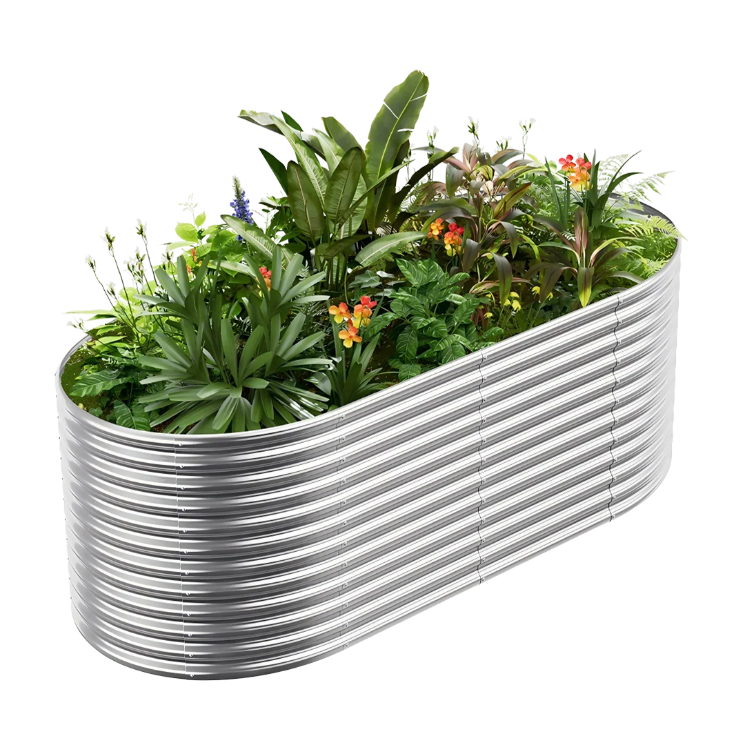 Galvanized steel raised garden bed overflowing with lush green plants and vibrant orange flowers.