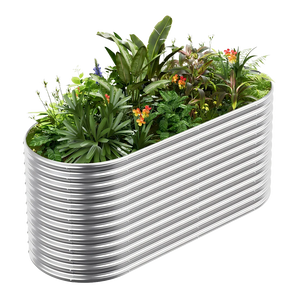 Corrugated galvanized steel raised garden bed filled with diverse plants and flowers.