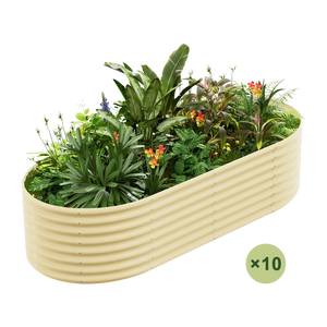 Galvanized raised garden bed, 24" tall, oval shape, filled with lush green plants and colorful flowers.