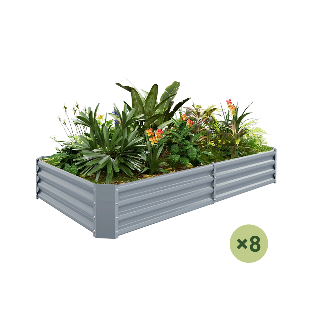 Grey corrugated metal raised garden bed filled with plants and flowers. Includes 8 sections.