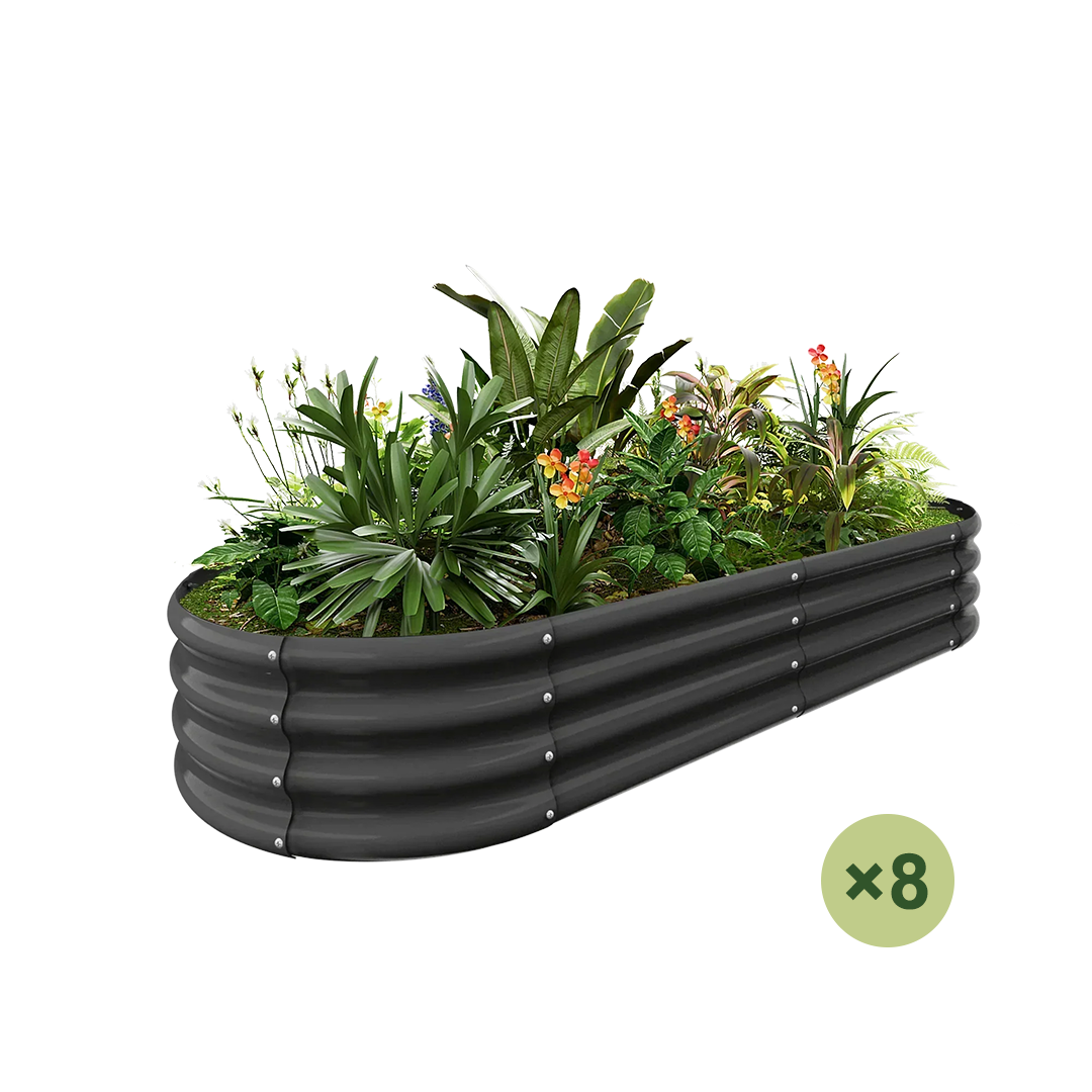 8-pack oval galvanized raised garden bed filled with lush plants and flowers.
