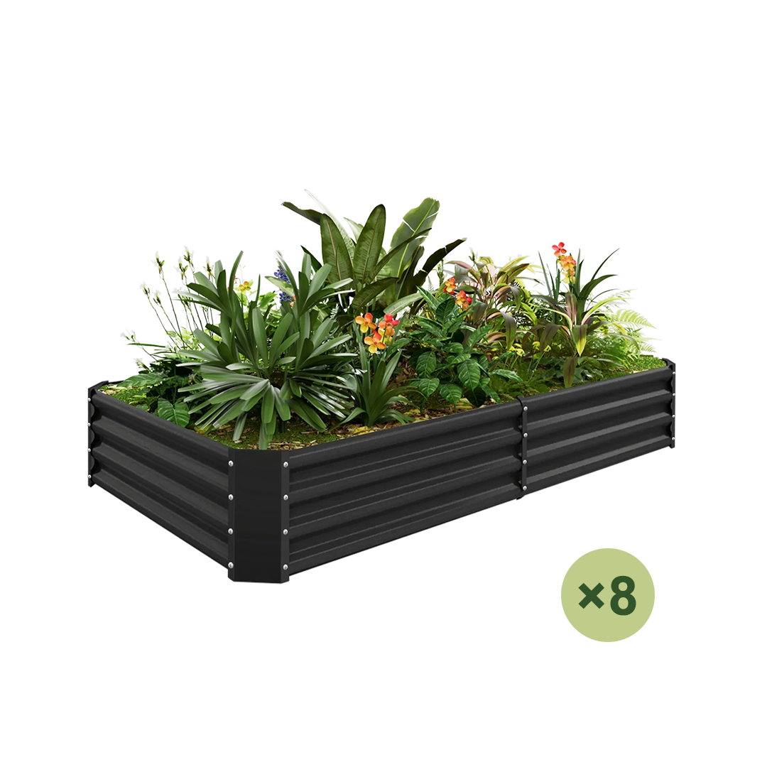 Black metal raised garden bed with lush plants and flowers. Includes 8 units.